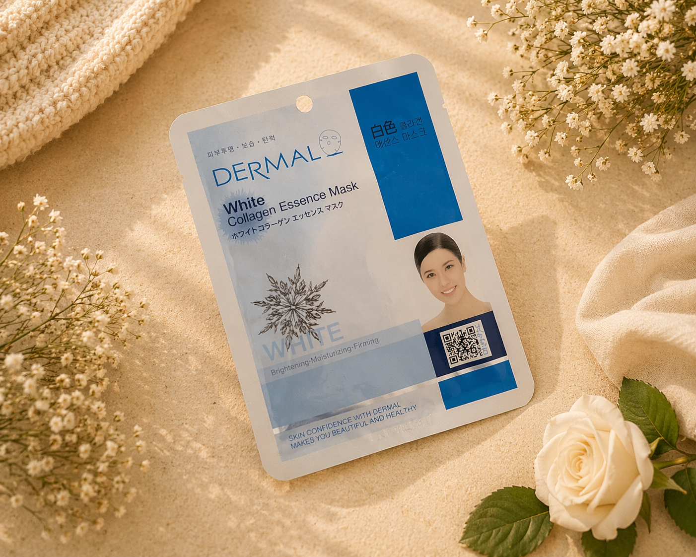 DERMAL White Collagen Essence Mask on a soft beige background with flowers