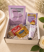 Gift box with snacks and beauty products on a soft background